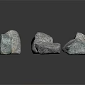 Several Natural Gray Stones With Rough Surface Texture On Dark Background