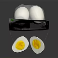 Free Range Chicken Eggs Halved Boiled with Carton and Green Leaf