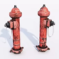 Two Red Fire Hydrants As Fire Safety Equipment With Rusty Details And Valve Connections