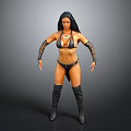 Woman In Black Bikini With Patterned Arm Cuffs And Long Boots Standing Pose