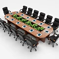 Modern Wooden Conference Table With Black Office Chairs Green Plants And Laptops