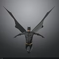 Man in Batman Costume with Large Wings Standing on Gray Background