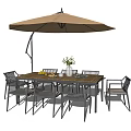 Outdoor Dining Table and Chairs Set With Beige Umbrella Vase and Fruits on Wooden Surface