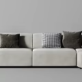 Modern Beige Sectional Sofa Featuring Multiple Patterned Cushions Round Pillow And Book 3d model