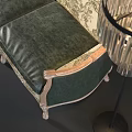 Classic Multi Person Sofa With Carved Wooden Frame And Dark Green Velvet Cushions