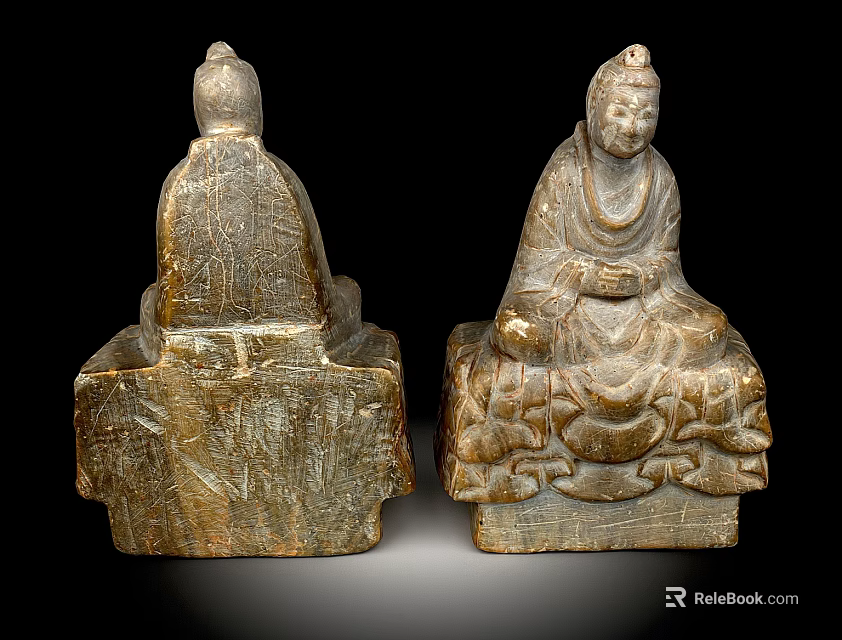 Ancient Stone Sculptures With Intricate Carved Details And Seated Posture 3d model 
