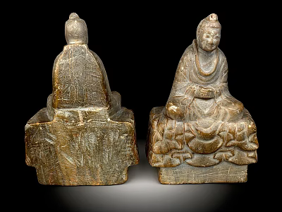 Ancient Stone Sculptures With Intricate Carved Details And Seated Posture 3d model