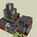 Historic Multi Story Brick Building With Red Structures Trees And Black Car