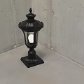 Black Decorative Outdoor Light With Column Style Square Base And Transparent Shade For Garden Courtyard