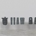 Stone Wood Wall Decorations With Various Shapes Hanging On White Wall