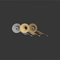 Three Shiny Silver And Gold French Horns Musical Instruments On Black Background With Reflections