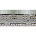 Modern Commercial Kitchen Featuring Long Stone Counter Glass Display Cabinets And Overhead Hood