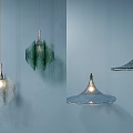 Unique Design Glass Pendant Lights Hanging On Light Blue Wall With Illuminated Glow
