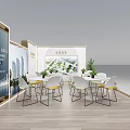 Modern Exhibition Booth Interior With Tables Chairs Display Walls And Green Plants