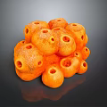 Orange Porous Stone Stack With Circular Holes On Dark Background