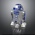 R2 D2 Robot Character With Blue White Design Silver Accents And Shiny Surface