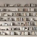 Organized Books And Magazines On Multi Layered Bookshelves With Various Sizes And Neat Rows