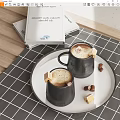 Two Black Coffee Mugs With Frothy Coffee On White Tray And Hazelnuts Near Books