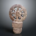 Intricate Wheel Shaped Carved Stone Sculpture With Spokes And Base Design