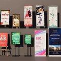 Various Advertising Billboards With Promotional Content Diverse Designs And Display Stands