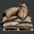 Multiple Hessian Sandbags With Branded Logos Stacked On Industrial Wooden Pallet