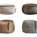 Various Colored Sofa Stools With Leather And Fabric Textures And Decorative Straps