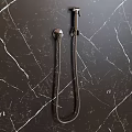 Elegant Modern Handheld Shower with Chrome Finish and Control Knob Mounted on Marble Wall 3d model
