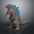 Giant Godzilla Figure Standing With Blue Spines And Gray Textured Skin