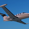 White Passenger Jet Flying In Clear Blue Sky With Sleek Wings And Windows