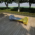 Gray and Yellow Dumbbell Shaped Outdoor Chair on Wooden Deck with Trees and Bushes
