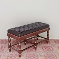Classic Tufted Leather Sofa Bench With Carved Wooden Legs On Patterned Carpet