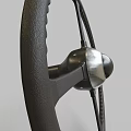 Classic Car Steering Wheel With Textured Grip And Metallic Center Spokes