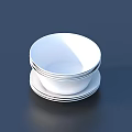 Household White Stacked Bowls And Plates On Dark Smooth Surface