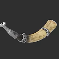 Ancient Horn Shaped Weapon Featuring Silver Ornate Bands And Intricate Carvings