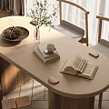 Oval Wooden Dining Table Set with Matching Chairs Decorative Bowl Books Coffee Cup and Plant