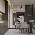Modern Dining Area With Round Black Table Grey Chairs And Illuminated Display Shelves