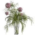 Elegant Floral Display with White Flowers and Green Foliage in Transparent Glass Vase