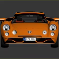 Orange Sports Car 3D Model With Sleek Body Black Roof And Stylish Wheels