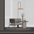 Beige Accent Chair with Metal Legs Near Round Side Table Pendant Light and Roller Blinds