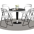 Round Black Dining Table Set With White Folding Chairs And Gray Rug 3d model
