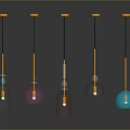 Multiple Colorful Hanging Decorative Objects With Yellow Tops Black Strings And Transparent Parts