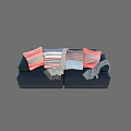 Dark Blue Two Seater Sofa With Colorful Patterned Cushions And Grey Knitted Throw