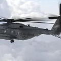 Military Helicopter Flying Through Clouds With Rotating Rotors In Sky