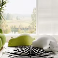 Green White Bear Shaped Bean Bag Chairs By Window With Scenic View And Zebra Rug