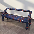 Navy Blue Public Bench With Orange Stripes And Tubular Structure On Wooden Floor Against Wall