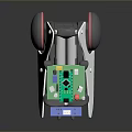 Robotic Device Featuring Green Circuit Board Gray Wheel Red Button and White Housing