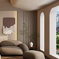 Modern Cozy Living Room Interior With Curved Sofa Round Coffee Table And Decorative Artwork