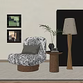 Black And White Patterned Single Sofa With Side Table Lamp Plant And Wall Art 3d model