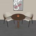 Two Modern Lounge Chairs With Round Black Table Orange Decor And 1951 Poster