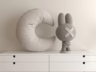 Gray Moon Plush Toy With Closed Eyes And Rabbit Figure On White Dresser 3d model
